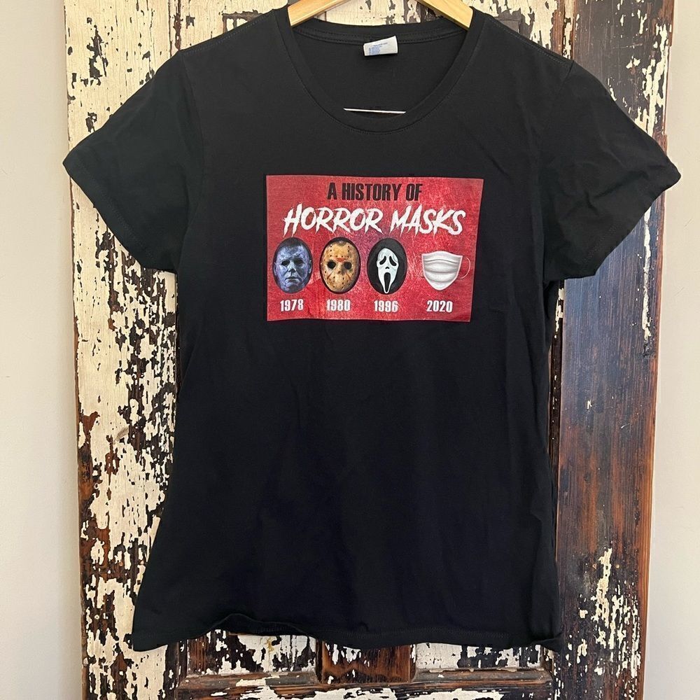 Women’s scoop next A History Of Horror MasksT-shirt. Size Medium.